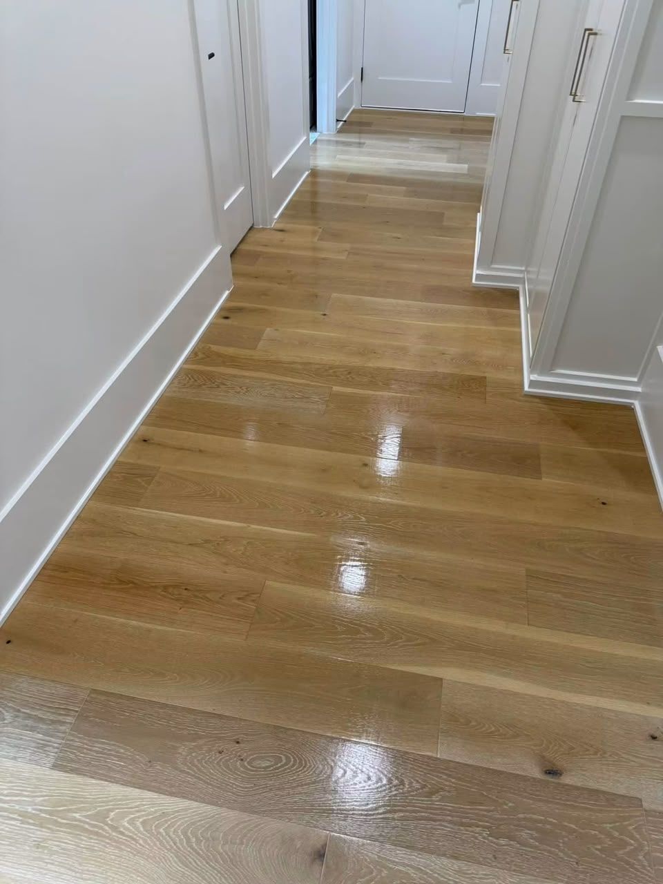 Gleaming hardwood hallway floor